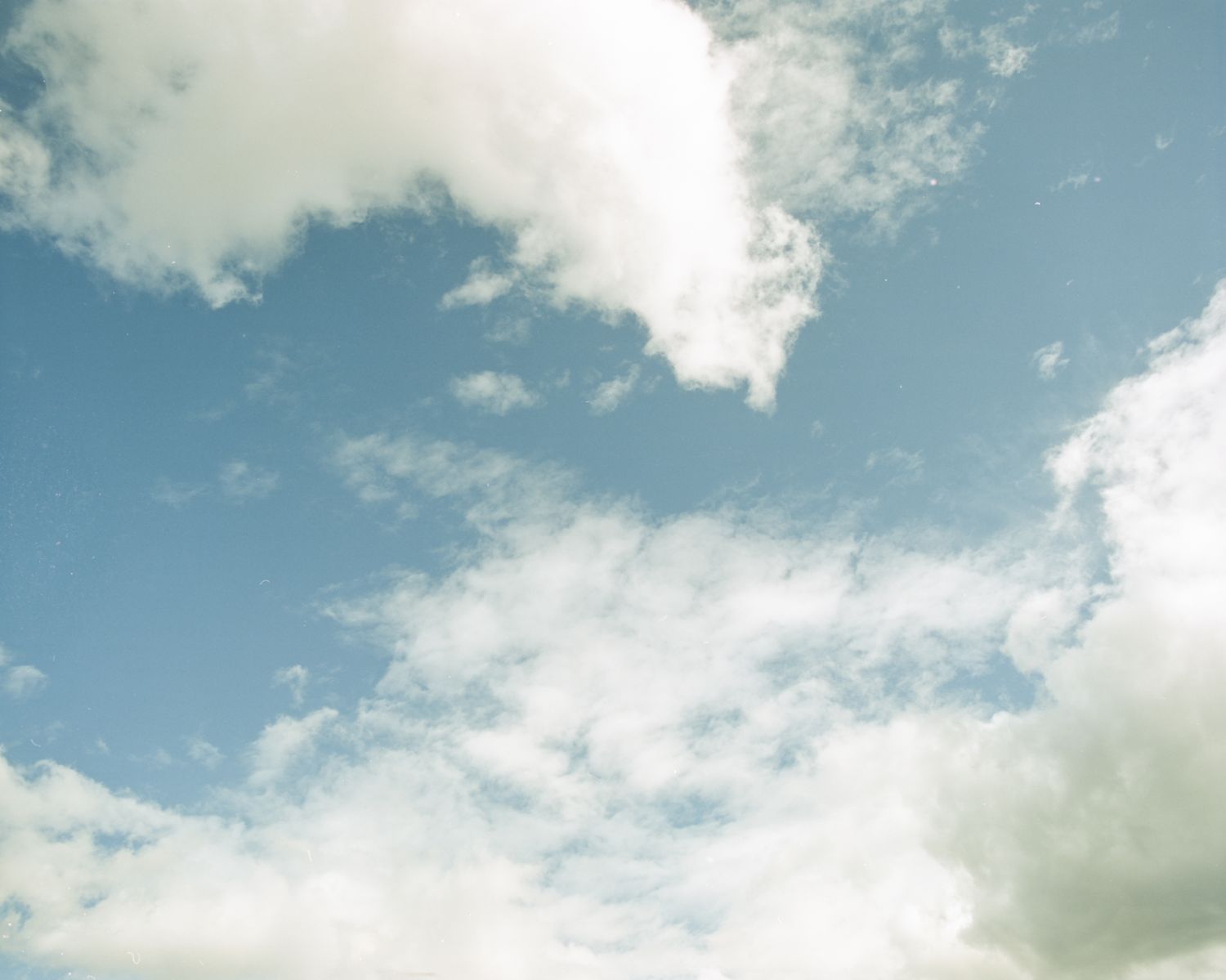Clouds in a pale blue sky